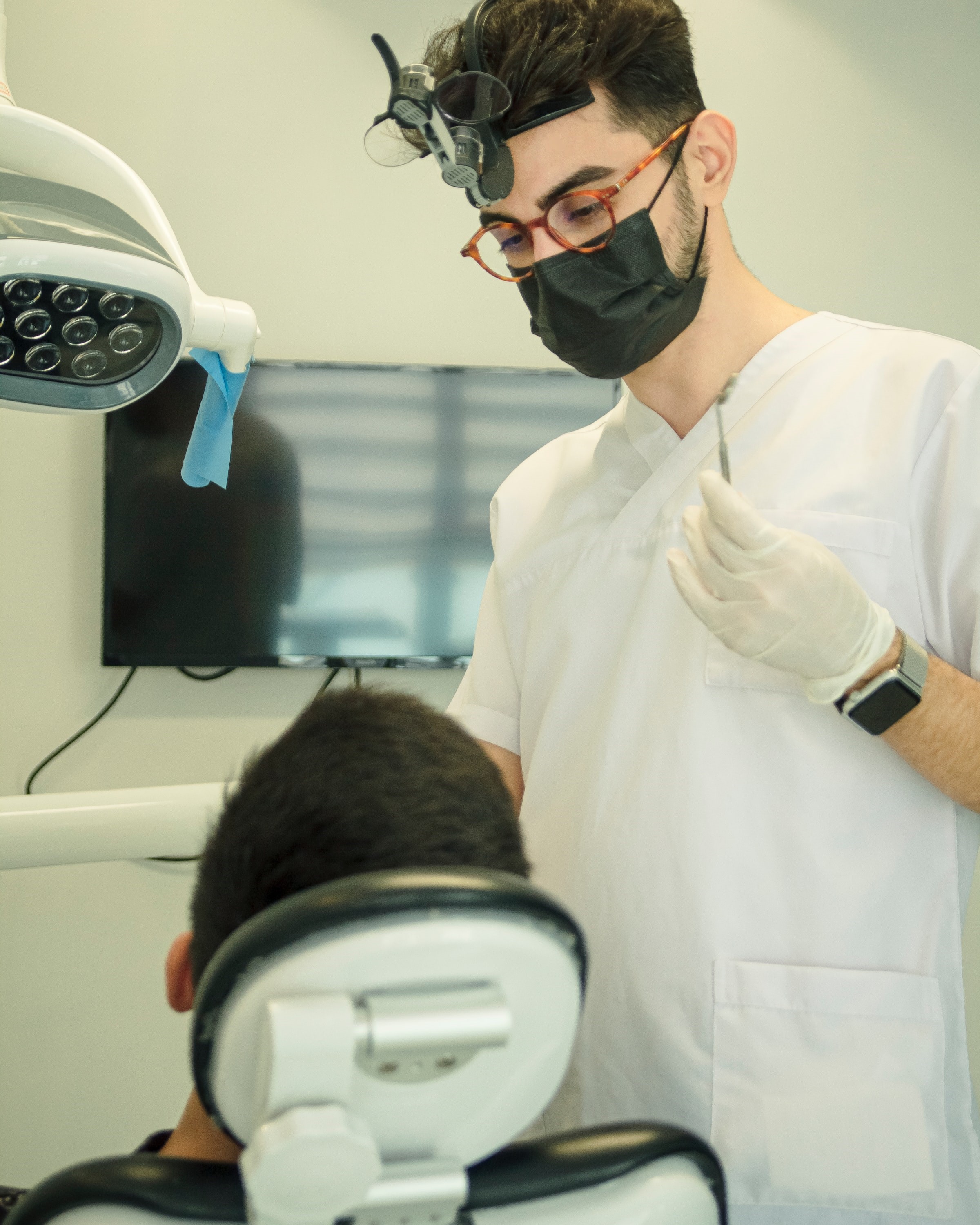 Specialist performing an eye test on a patient